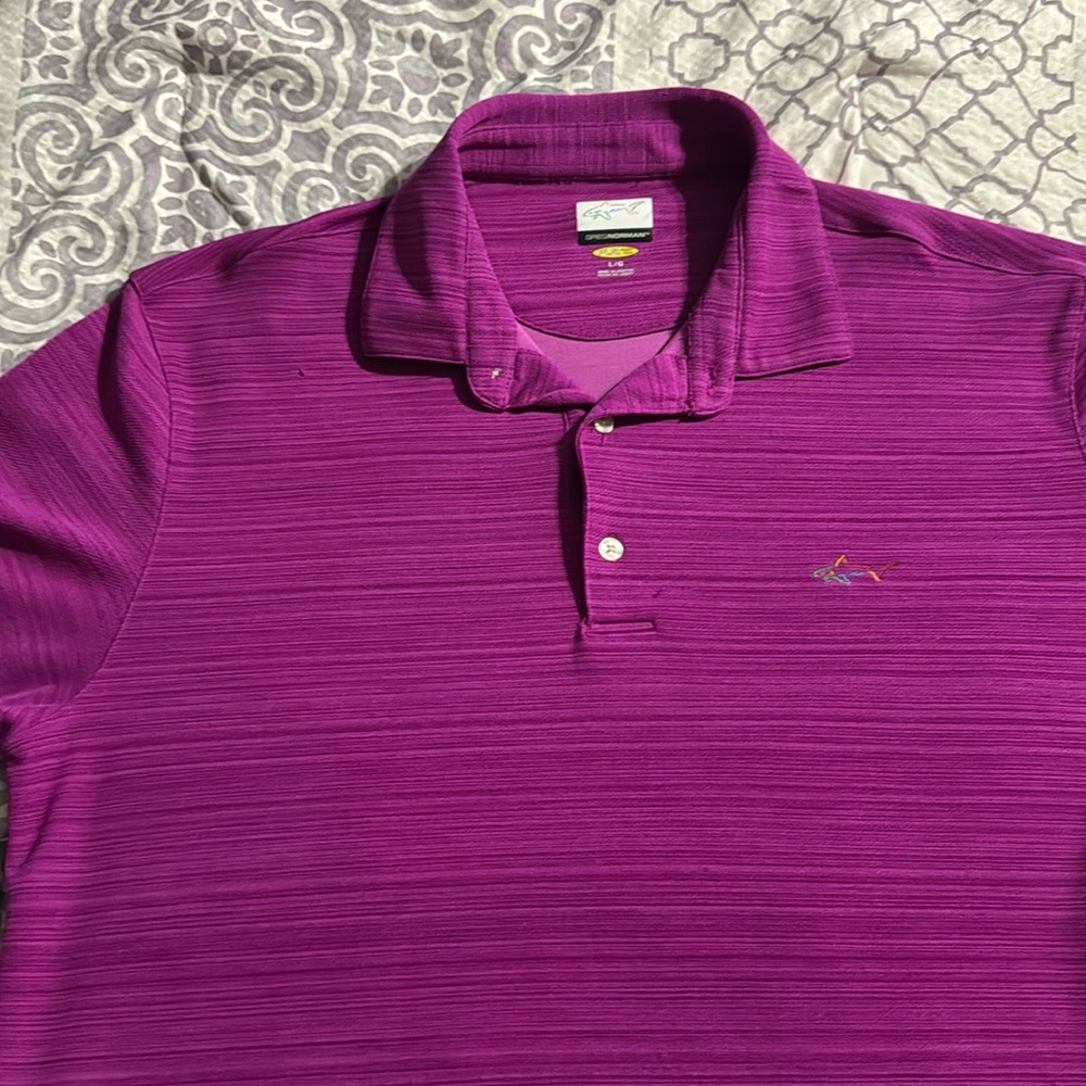 Greg Norman Size large polo, new condition, nice shirt!! Wrinkle free
